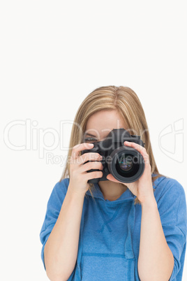 Female photographer with photographic camera