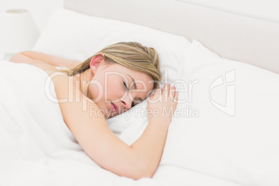 High angle view of beautiful young woman sleeping