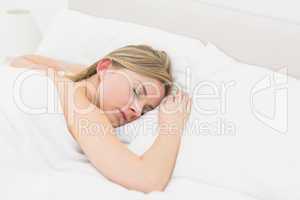 High angle view of beautiful young woman sleeping