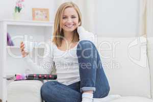 Portrait of woman with coffee cup at home