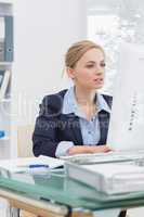 Business woman working on computer at office