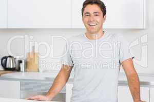 Smiling man in kitchen