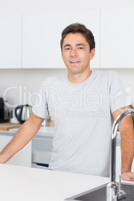 Handsome man in kitchen