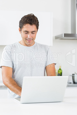 Happy man with laptop