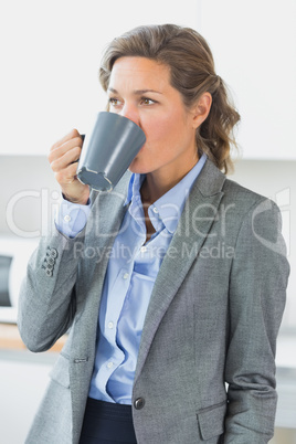 Woman having coffee before work