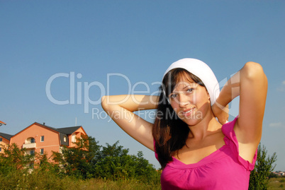 Young woman with hairbrush