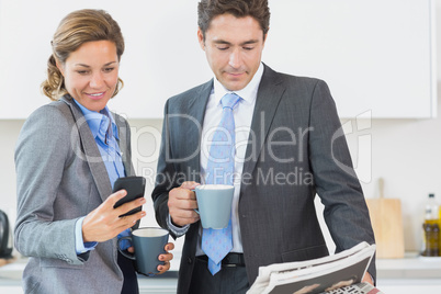 Couple having coffee before work