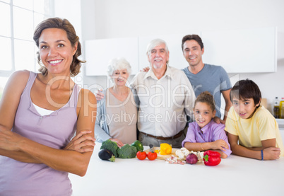 Mother standing beside kitchen counter