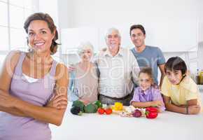 Mother standing beside kitchen counter