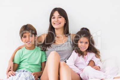 Mother in bed with children