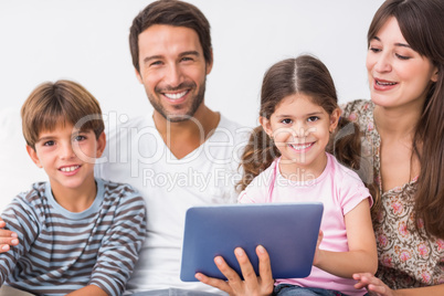 Happy family with tablet pc
