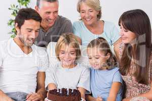Family celebrating young boys birthday