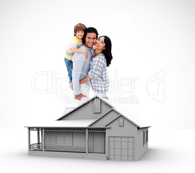 Family standing by graphic house Family standing by graphic house