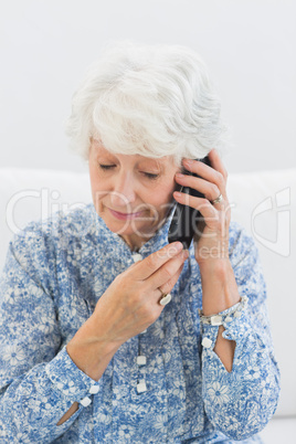 Aged woman phoning