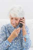 Aged woman phoning