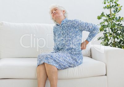 Elderly woman suffering with back pain