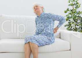 Elderly woman suffering with back pain