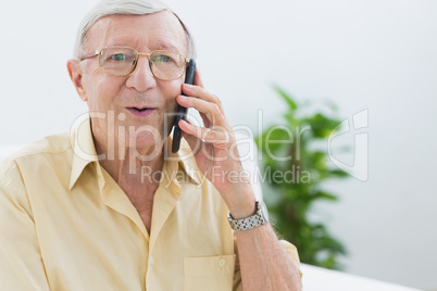 Elderly man phoning