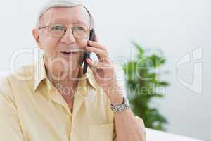 Elderly man phoning
