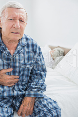 Aged man suffering with body pain