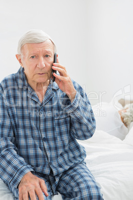 Old man calling someone