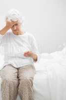 Old woman suffering with fever