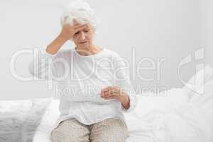 Aged woman suffering with fever