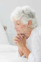 Aged woman praying