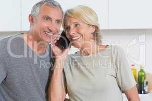 Couple taking a call together