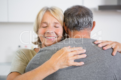 Joyful couple embracing