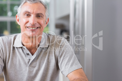 Portrait of man looking at camera