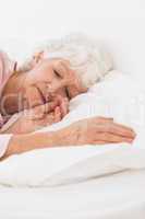 Woman sleeping in bed