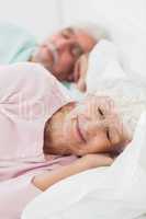 Elderly couple asleep