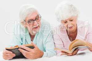Husband and wife reading and chatting
