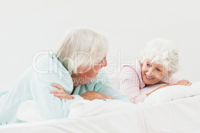 Couple chatting in bed