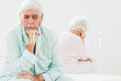 Sad husband not talking to wife