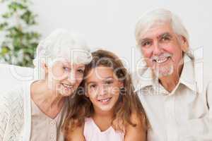 Grandparents with grandaughter