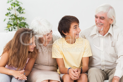 Grandparents with grandchildren chatting