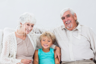 Grandson sitting with grandparents