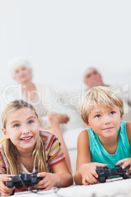 Brother and sister playing video games