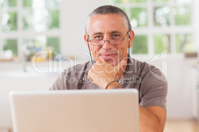 Happy man with laptop