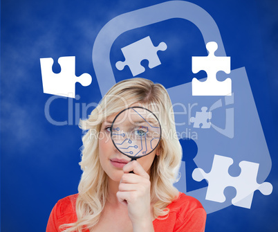 Woman looking through magnifying glass