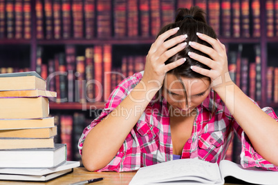 Stressed student in library