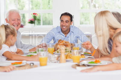 Happy family at thanksgiving