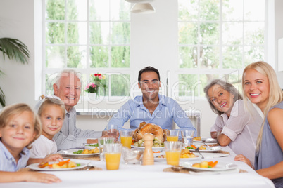 Family smiling at thanksgiving