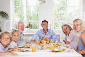 Family smiling at thanksgiving