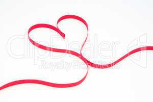 Pink ribbon in heart shape