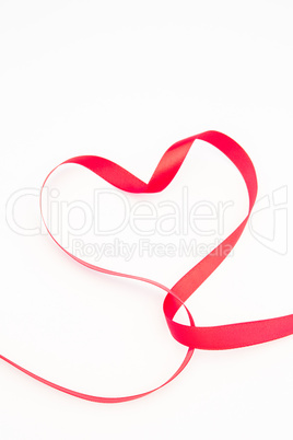 Pretty pink heart made out of ribbon