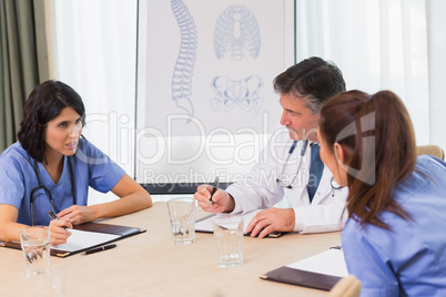 Nurses and doctors in a meeting