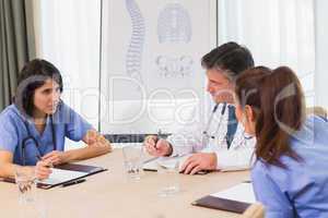 Nurses and doctors in a meeting